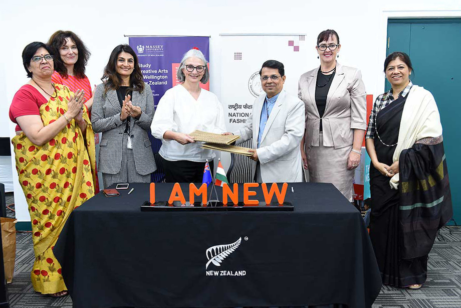 coca-india.jpg Professor Robinson and Shri Shantmanu of NIFT signing the memorandum.